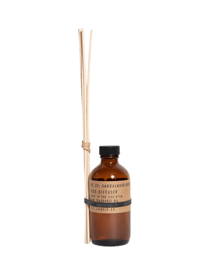 pf candle co sandalwood rose reed diffuser in amber glass bottle with black cap and kraft paper label 3 5oz woody floral home fragrance romantic nostalgic cozy scent