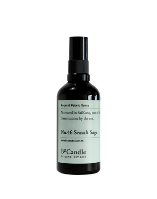 BeCandle Seasalt Sage room and fabric spray in a black glass bottle with cap and light blue label, a coastal and woodyhome fragrance.