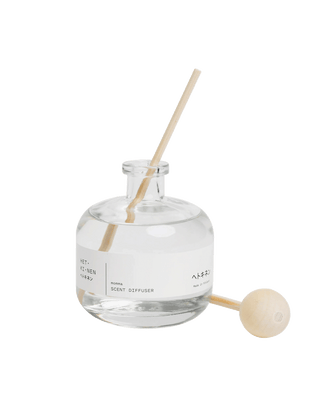 Hetkinen Co Momma reed diffuser from Finland in a minimalist 100ml glass bottle with 100% essential oil, offering a sweet pandan like home fragrance.