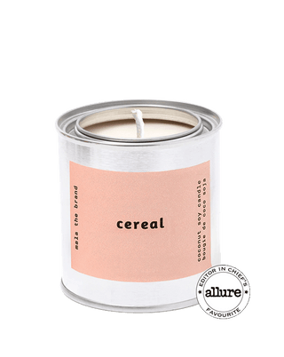 malathebrand cereal coconut soy wax scented candle in tin with light pink label 25 hour burn time gourmand citrus home fragrance