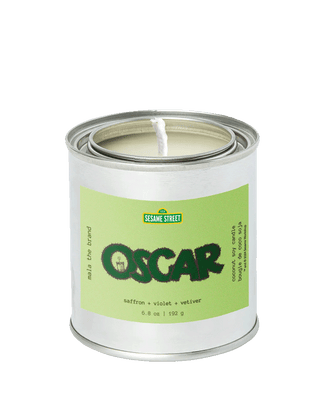 Limited edition Oscar scented candle from the Sesame Street x Malathebrand collaboration, in a tin with 45-hour burn time and gourmand home fragrance.