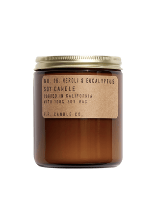 pf candle co neroli eucalyptus soy scented candle from classic collection in amber jar with kraft paper label and gold lid 50 hour burn time clean burn woody citrus fresh home fragrance uplifting and calming